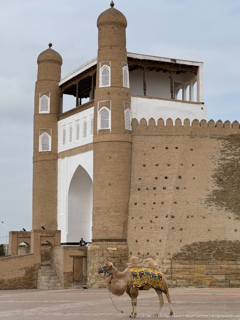 White-trimmed gate tower and crenellated wall at the Ark of Bukhara.