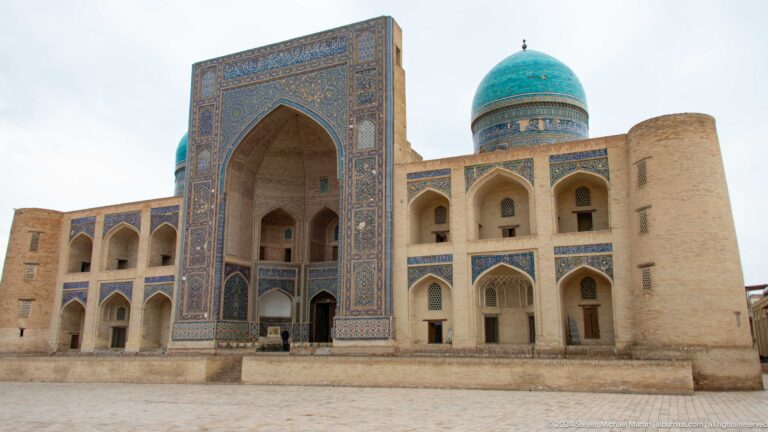 Mir-i-Arab Madrasa facade with turquoise dome.