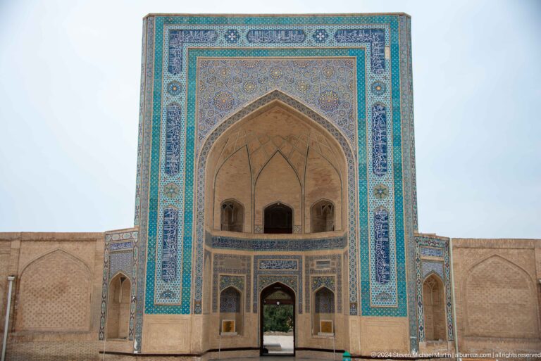Frontal view of tiled entrance portal.