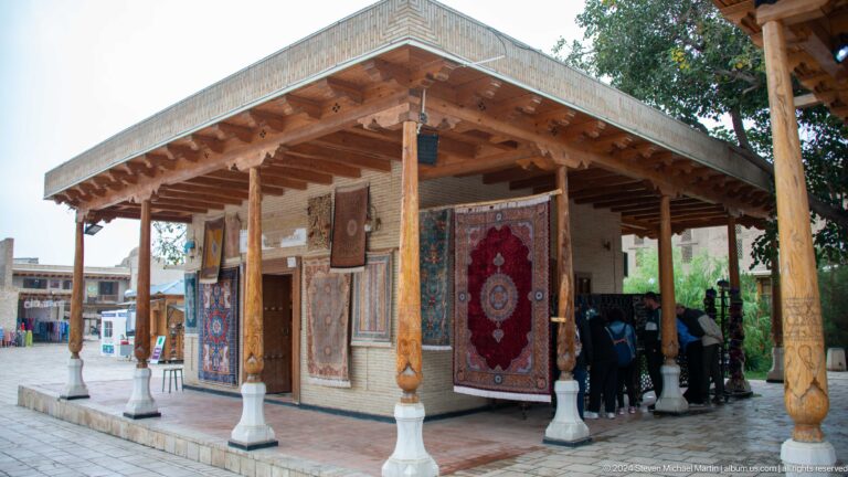 Open pavilion displaying carpets.