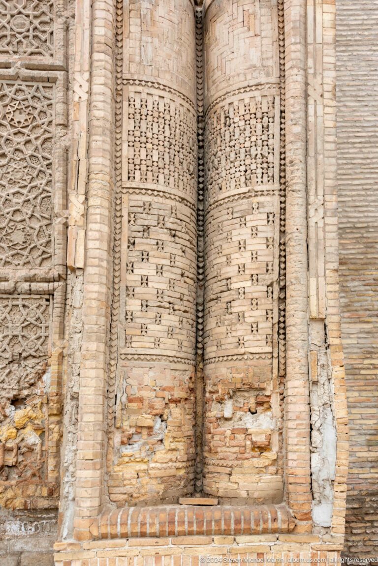 Close-up of patterned brick masonry.