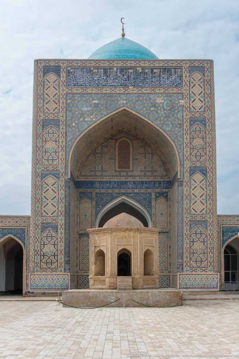 Blue-tiled monumental portal facade.