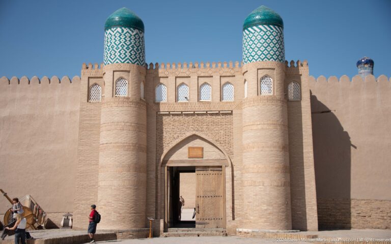 Monumental gateway between round towers.