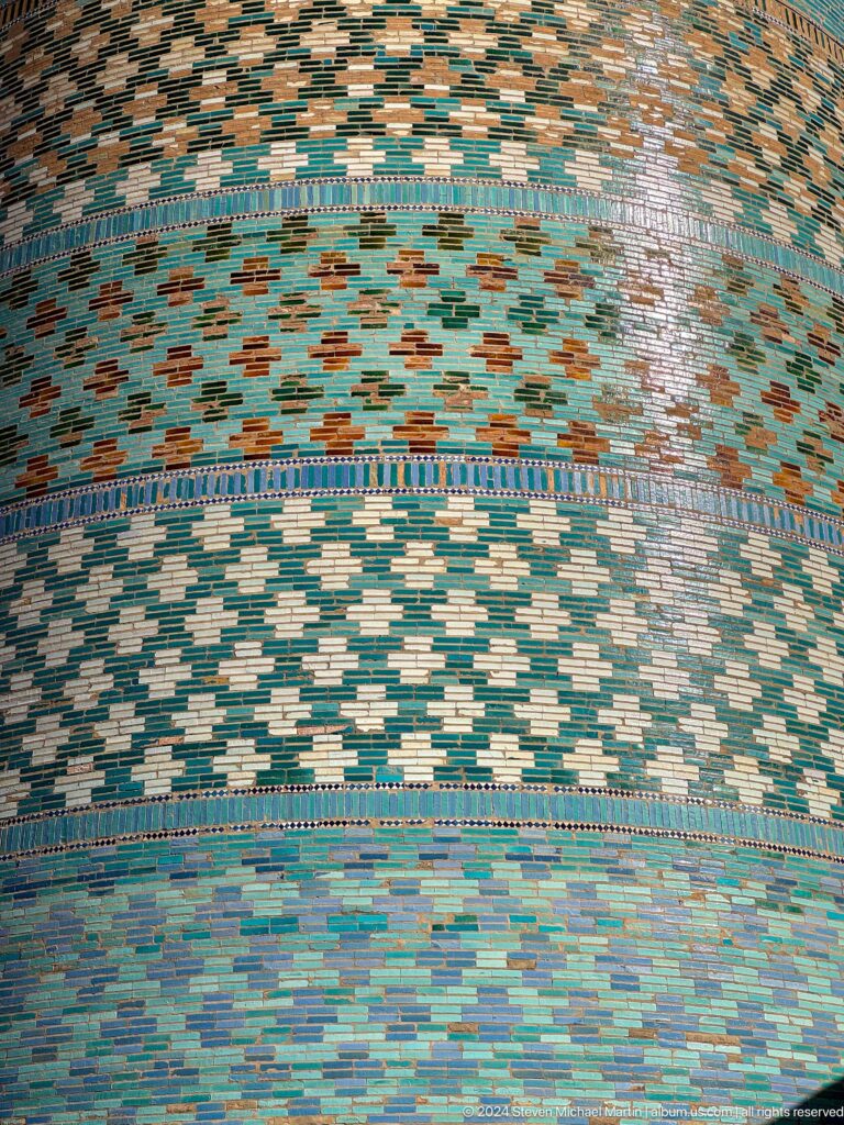 Close view of kalta minor turquoise geometric bands.