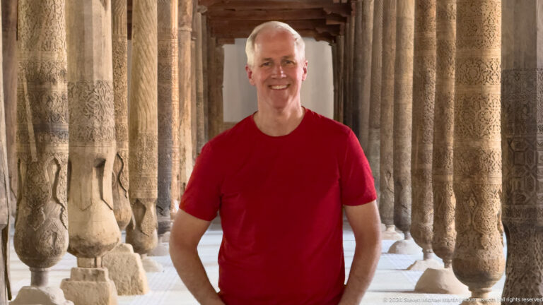 Second portrait of smiling man in juma mosque.