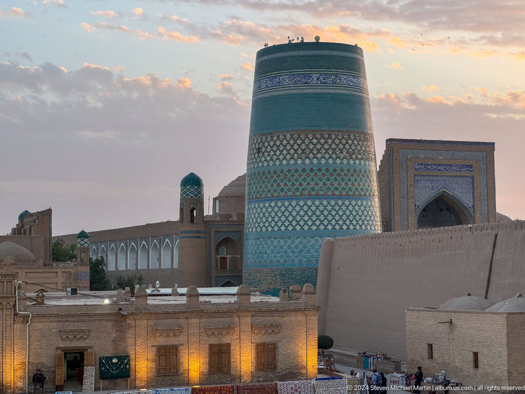 Kalta minor and madrasa portal at sunset.