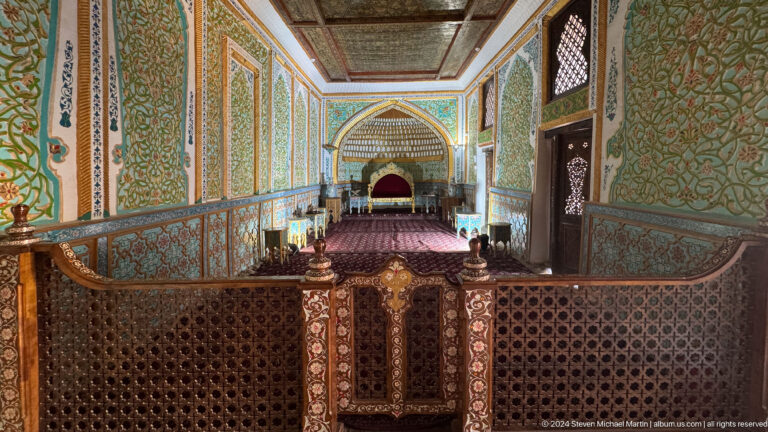 Wider view of decorated throne room.