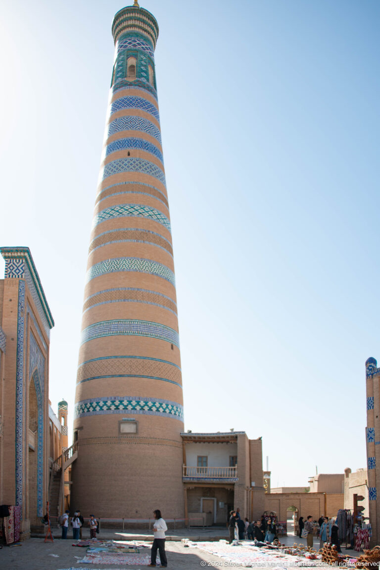 Islam khoja minaret against clear blue sky.