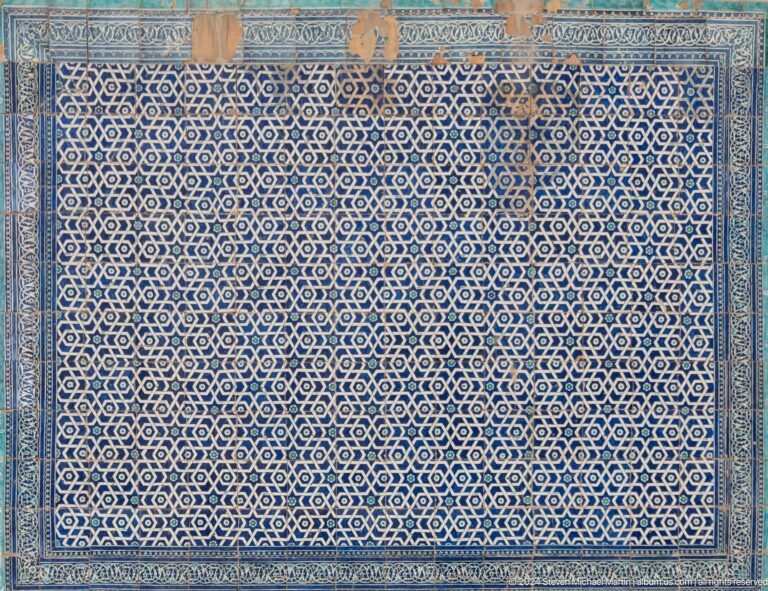 Dense blue-and-white geometric tile field.