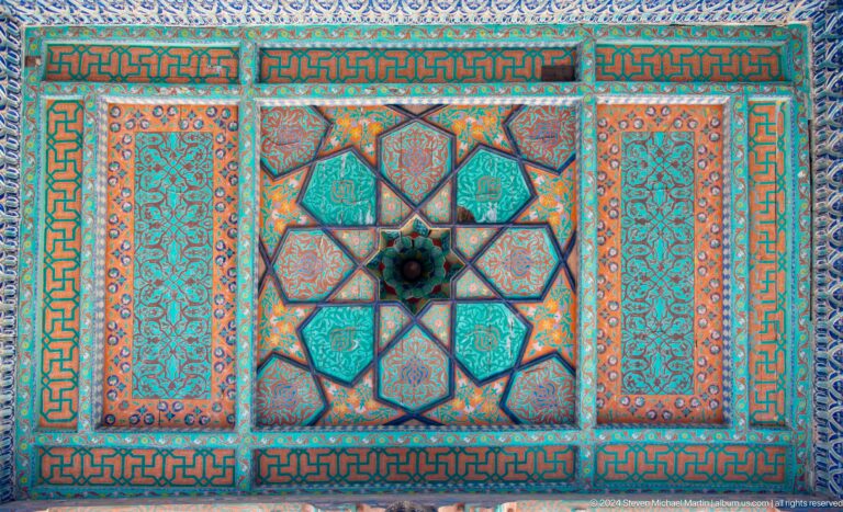 Painted ceiling panel with central star medallion.