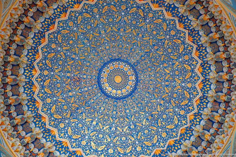 Dense blue-and-gold star pattern radiating from a small central rosette at the Khast Imom complex in Tashkent.