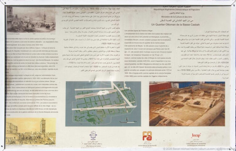 Outdoor interpretation panel with Arabic and French text, maps, plans, and excavation images about an Ottoman-era area of Algiers.