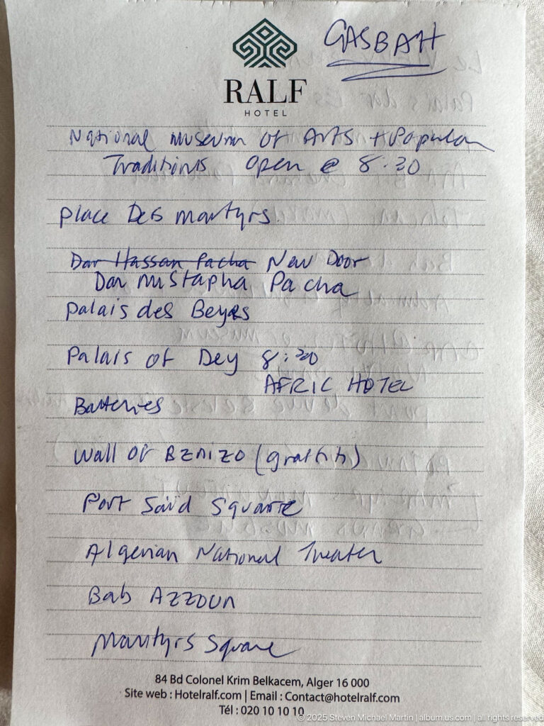 Handwritten Algiers sightseeing itinerary on Ralf Hotel notepaper listing the Casbah, museums, squares, and other stops.