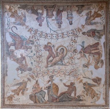 Large Dionysiac or Bacchus Mosaic from Djemila with a central mythological scene surrounded by numerous figures and circular motifs.