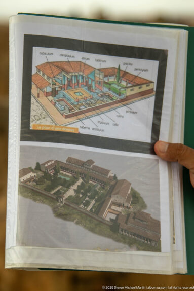 Open guidebook page with two color architectural reconstruction diagrams of a Roman building complex.