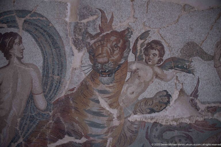 Striped marine tiger between a Nereid and winged Cupid in Aspasios's Mosaic of the Nereids.