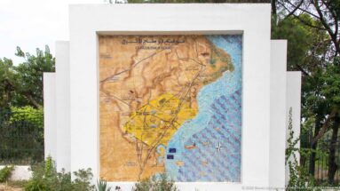 Outdoor visitor map of the Antonine Baths archaeological park showing paths, ruins, shoreline, and surrounding streets.