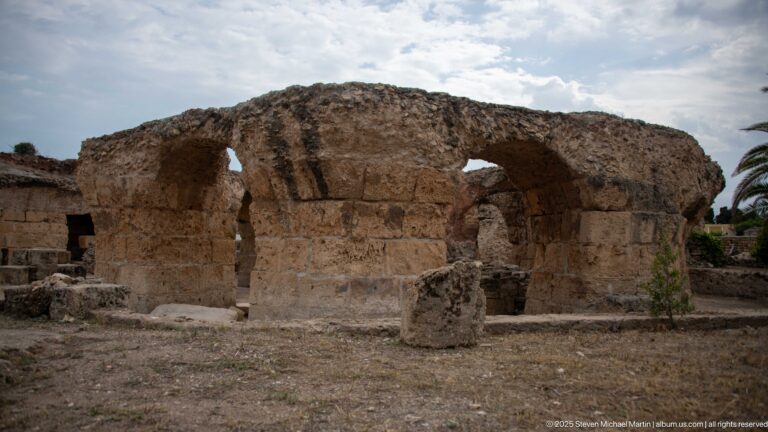 Massive stone piers and intersecting rounded arches in the substructures of the Baths of Antoninus.