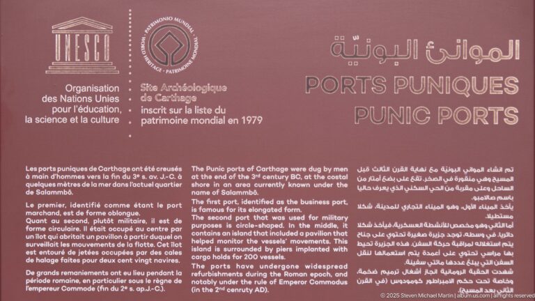 Multilingual UNESCO panel titled Punic Ports with Arabic, French, and English text about Carthage's ancient harbors.