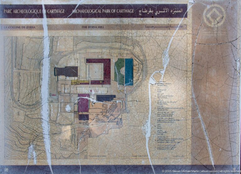 Weathered site plan labeled “Archaeological Park of Carthage – The Byrsa Hill” with colored excavation zones and contour lines.