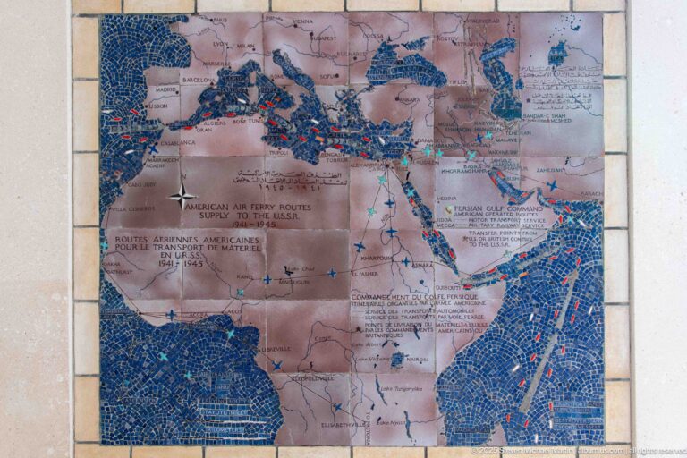 Large mosaic world-region map showing Allied air ferry and supply routes with aircraft symbols and colored lines.