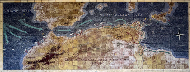 Mosaic map titled American and Allied Forces in North Africa 1942–1943 with colored arrows across the Maghreb.
