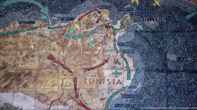 Close-up mosaic map of Tunisia with Tunis, colored arrows, aircraft symbols, and coastal place names.