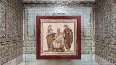 Third-century Roman mosaic from Sousse showing Virgil seated with the Aeneid between the standing Muses Clio and Melpomene.