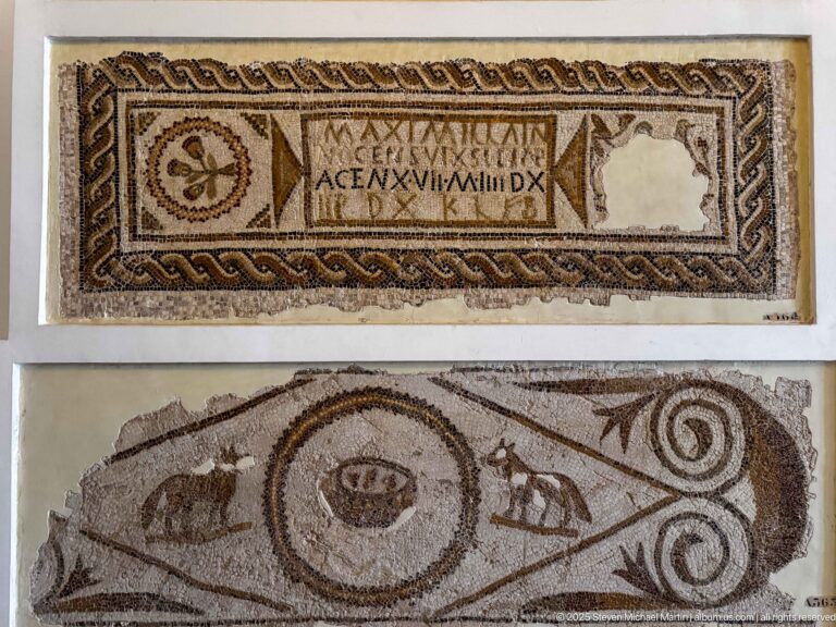 Two horizontal Christian mosaics with Latin inscriptions, braided borders, circular emblems, animals, and scrolling motifs.