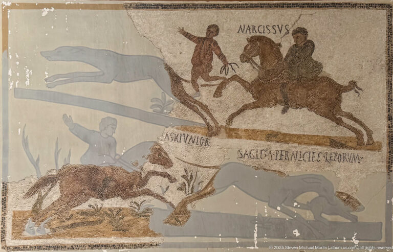 Fragmentary Roman hunting mosaic with mounted hunters, running animals, vegetation, and the visible Latin inscription NARCISSVS.