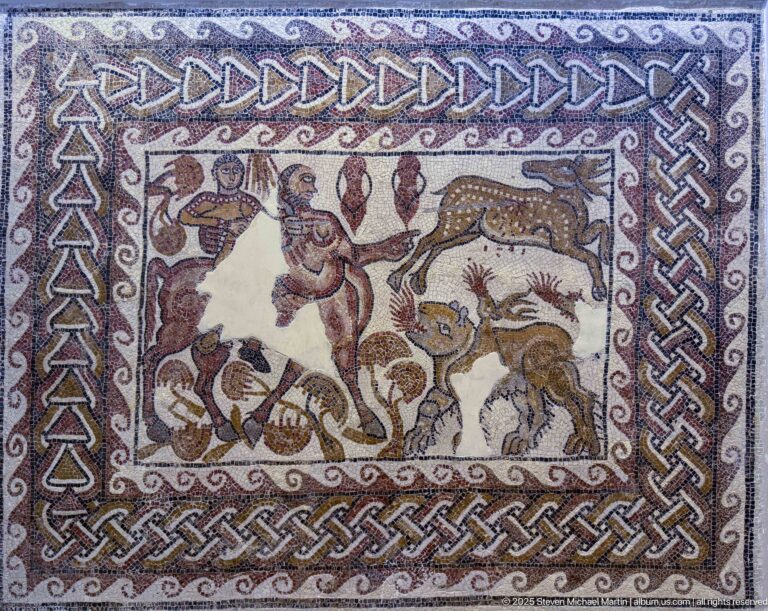 Roman animal mosaic with central large feline, deer, birds, and other creatures framed by broad interlace borders.