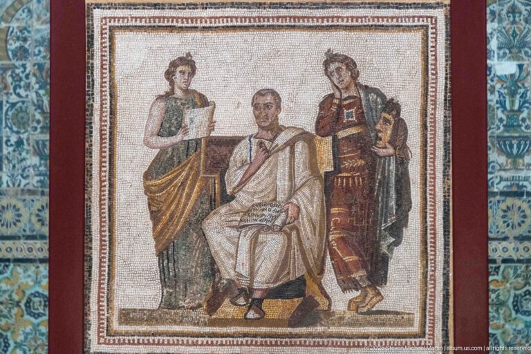 Virgil seated with an Aeneid scroll between the standing Muses Clio and Melpomene in an early third-century Roman mosaic.