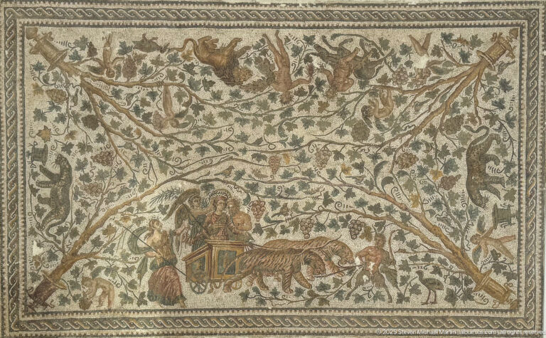 Large Roman mosaic with hunters, trees, many wild animals, a cart, and a large striped feline in a continuous landscape.