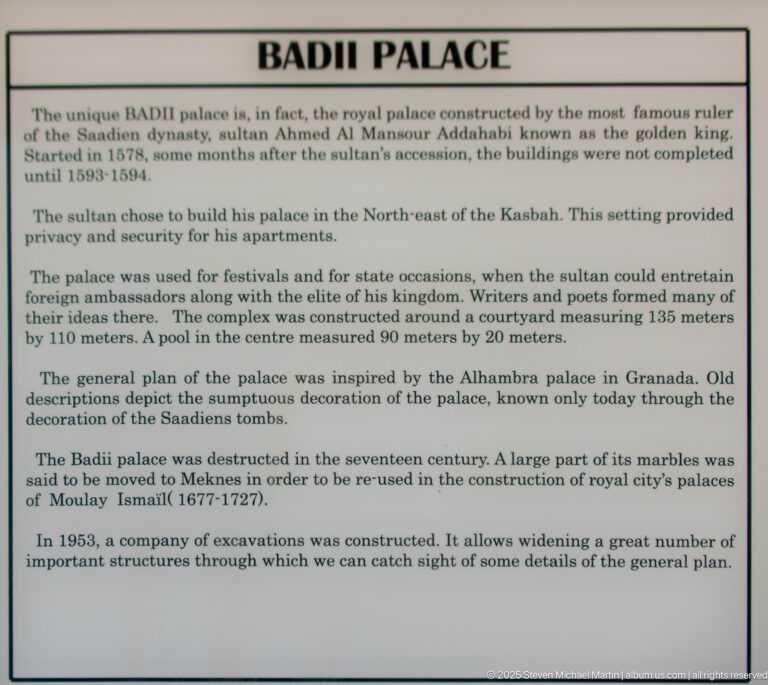 Historical information panel at Badii Palace describing the Saadian palace, Ahmed al-Mansour, construction, later dismantling, and excavations.