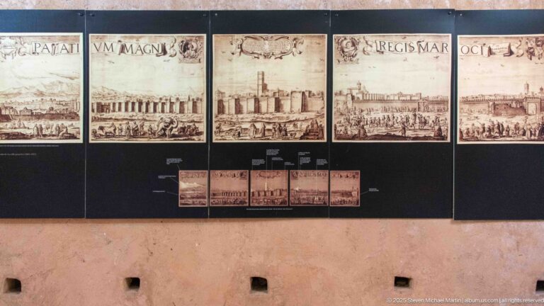 Display of historic engraved panoramas of Marrakech arranged in a row above smaller reproductions.