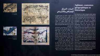 Trilingual interpretive panel titled Aghmat, geographical and historical context, with maps and historical illustrations.