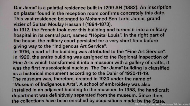 English interpretive panel describing the history of Dar Jamaï, its 1882 construction, and conversion to a museum in 1920.