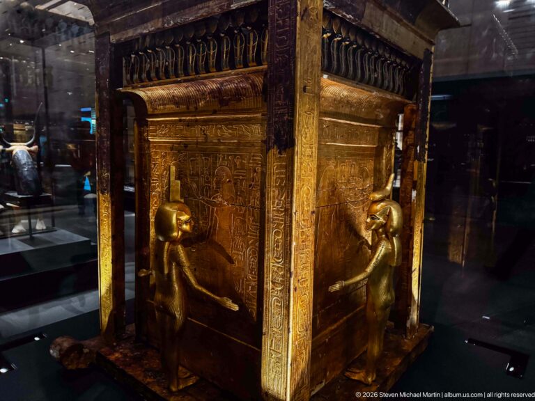 Close corner of Tutankhamun’s Canopic Shrine on a Sledge with two gilded protective goddesses.