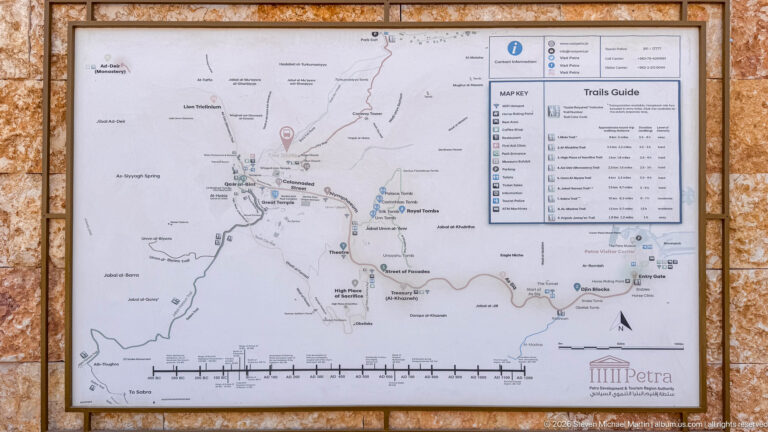 Petra trails guide showing site map, walking routes, landmarks, trail legend, and estimated hiking times.