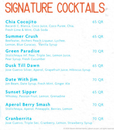 Close view of a cocktail menu listing mixed drinks and prices in QR, including Summer Crush and Green Paradise.