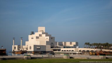 Museum of Islamic Art in Doha, a pale stepped geometric building beside the waterfront.