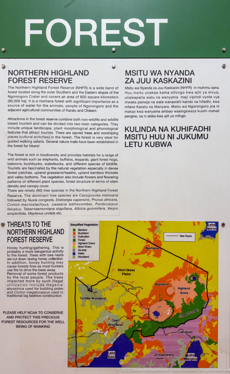 Interpretive panel about the Northern Highland Forest Reserve with blocks of text and a colorful geological map.