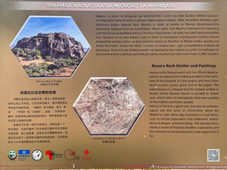 Interpretive sign titled Nasera Rock Shelter and Paintings with site photographs, rock-art detail, and multilingual text.