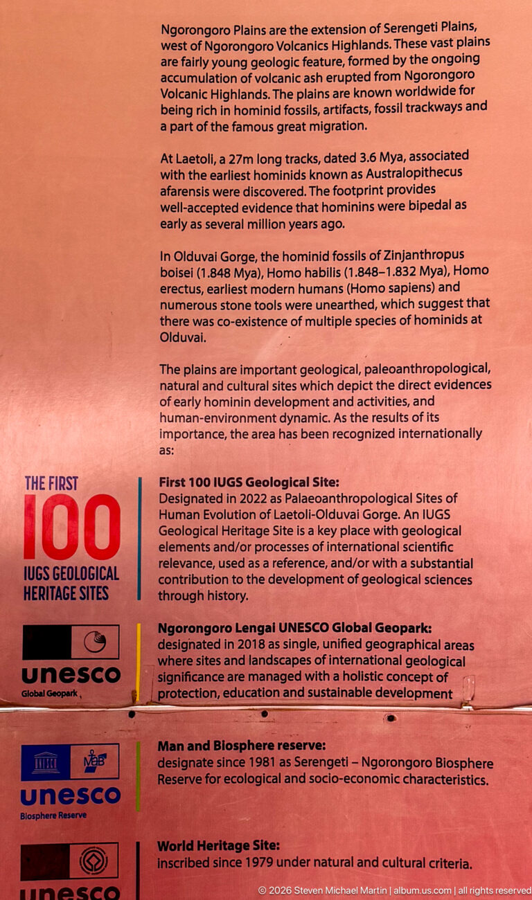 Large UNESCO interpretive panel describing the archaeological, geological, ecological, and cultural significance of Ngorongoro and Olduvai.