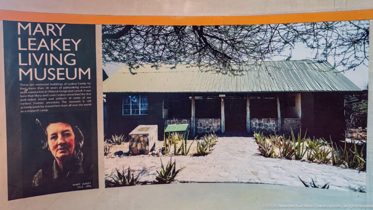 Leakey Living Museum panel with Mary Leakey portrait and a historic corrugated-roof building.