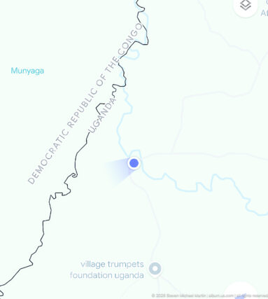 Digital map showing the Uganda–Democratic Republic of the Congo border, nearby waterways, and a blue location marker.