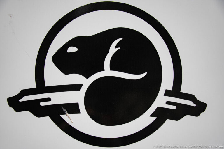 Black Parks Canada beaver emblem centered on a white field, shown in a tight crop.