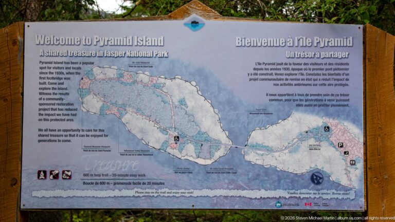 Bilingual Pyramid Island information panel with an island map, visitor guidance, and Parks Canada graphics.