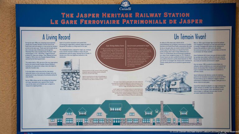 Bilingual Jasper Heritage Railway Station panel with historical text, small illustrations, and a long architectural elevation drawing.
