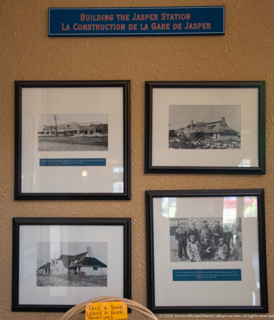 Framed historic station and group photographs beneath the bilingual heading Building the Jasper Station.